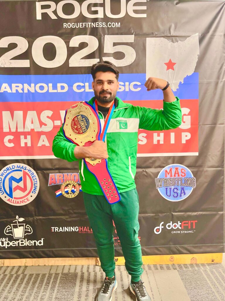 Muhammad Alam receiving wrestling award